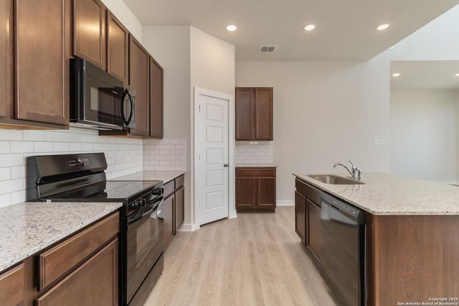 Furnished interior view inside a new home in Applewhite Meadows, San Antonio (Image 7). Furnished interior view inside a new home in Applewhite Meadows, San Antonio (Image 7).