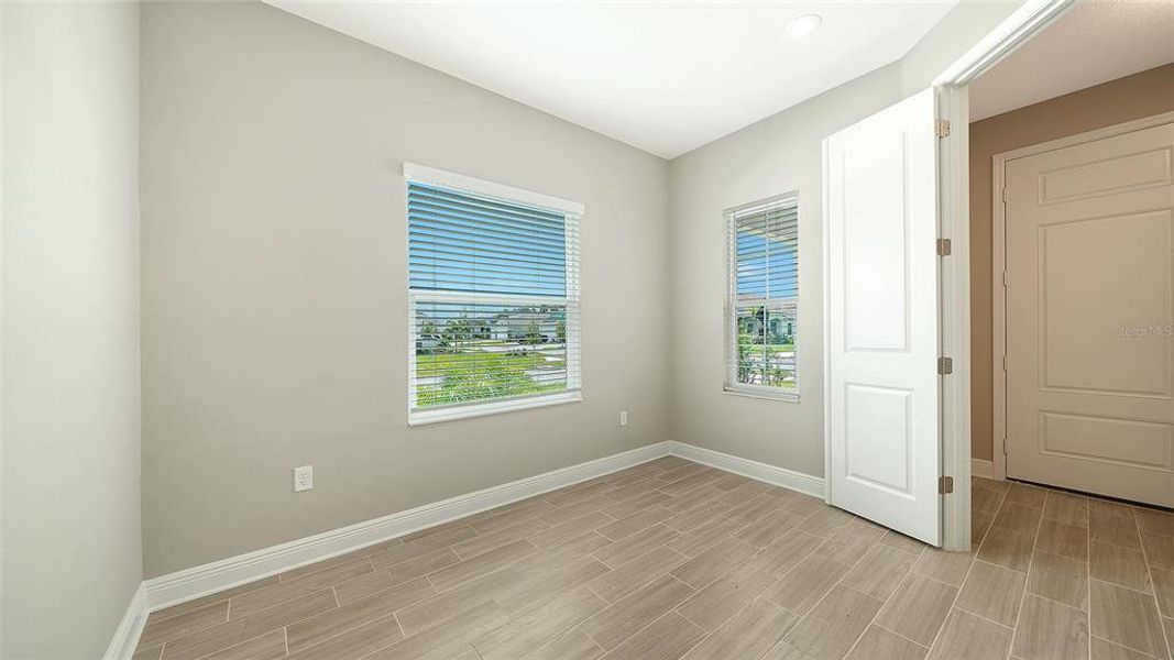 Spacious, unfurnished interior of a new home in Wildleaf at North River Ranch, Parrish (Image 35).
