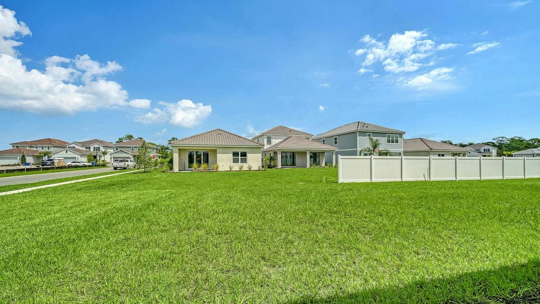 Exterior details and patio area of a home in Windward Real Estate and Homes for Sale in Sarasota, FL - Neal Communities, Lakewood Ranch (Image 25).