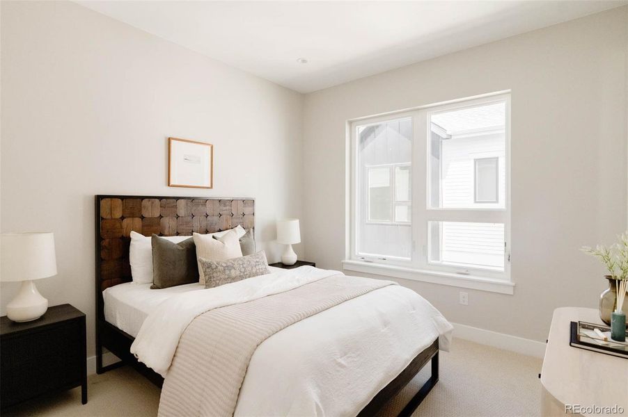 Furnished interior view inside a new home in A Line Townhomes, Denver (Image 9).