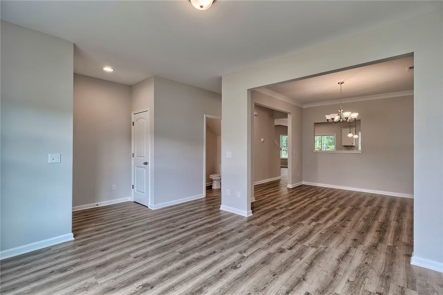 This inviting interior features elegant flooring,