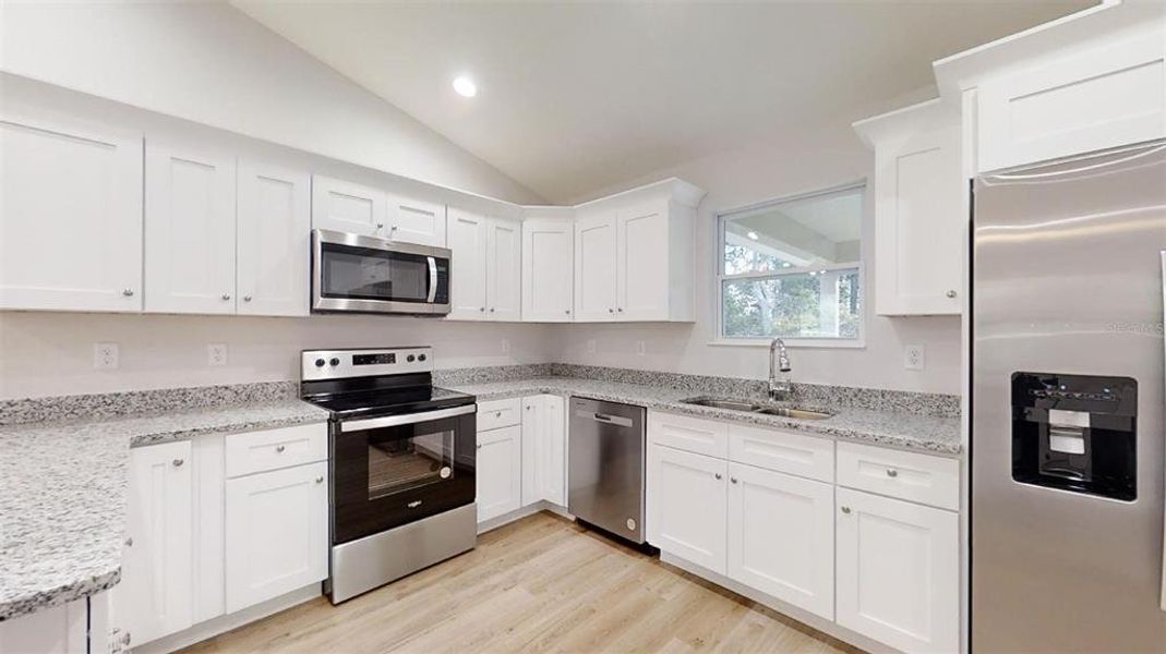 Furnished interior view inside a new home in , Dunnellon (Image 8).