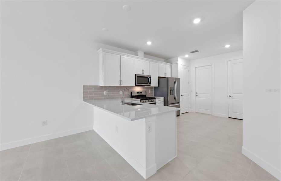 Furnished interior view inside a new home in BeachWalk by Manasota Key, Englewood (Image 10). Furnished interior view inside a new home in BeachWalk by Manasota Key, Englewood (Image 10).