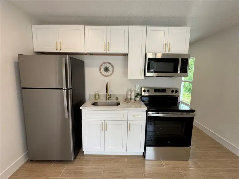 Furnished interior view inside a new home in , Vero Beach (Image 5). Furnished interior view inside a new home in , Vero Beach (Image 5).