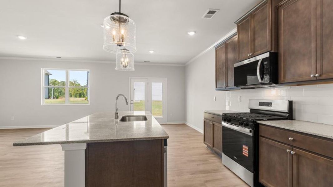 Furnished interior view inside a new home in Fairway 17 at Mirror Lake, Villa Rica (Image 10).