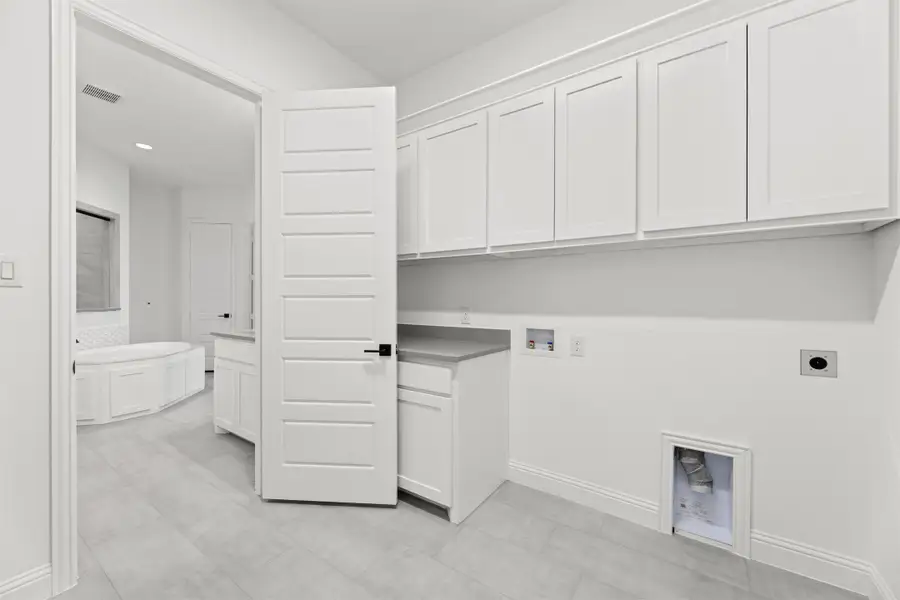 Representative furnished interior of a home built from the Newport by Windsor Homes in Nelson Lake Estates, Rockwall (Image 13).