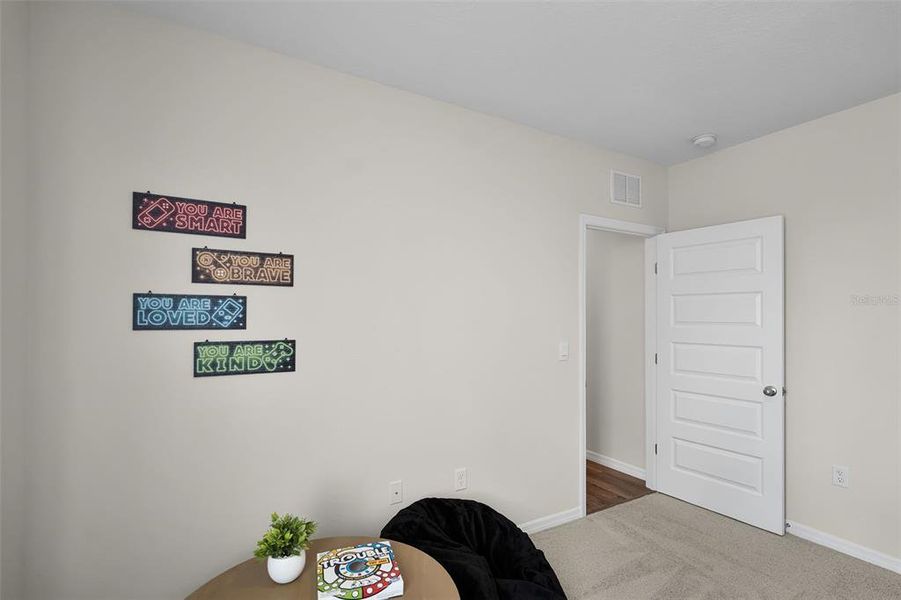 Furnished interior view inside a new home in Wind Meadows South, Bartow (Image 8).