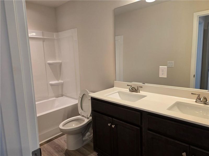 Furnished interior view inside a new home in Enclave at Logan Point, Loganville (Image 11).