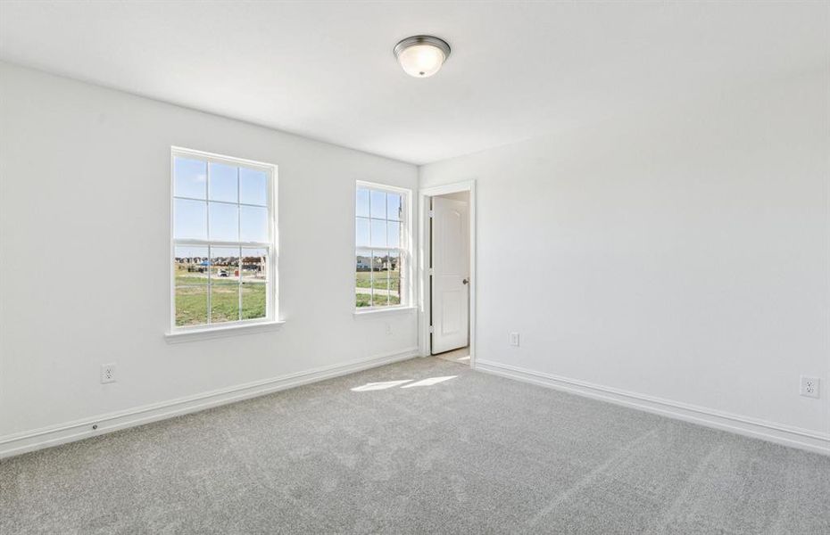 Second floor bedroom offering soft natural light Second floor bedroom offering soft natural light