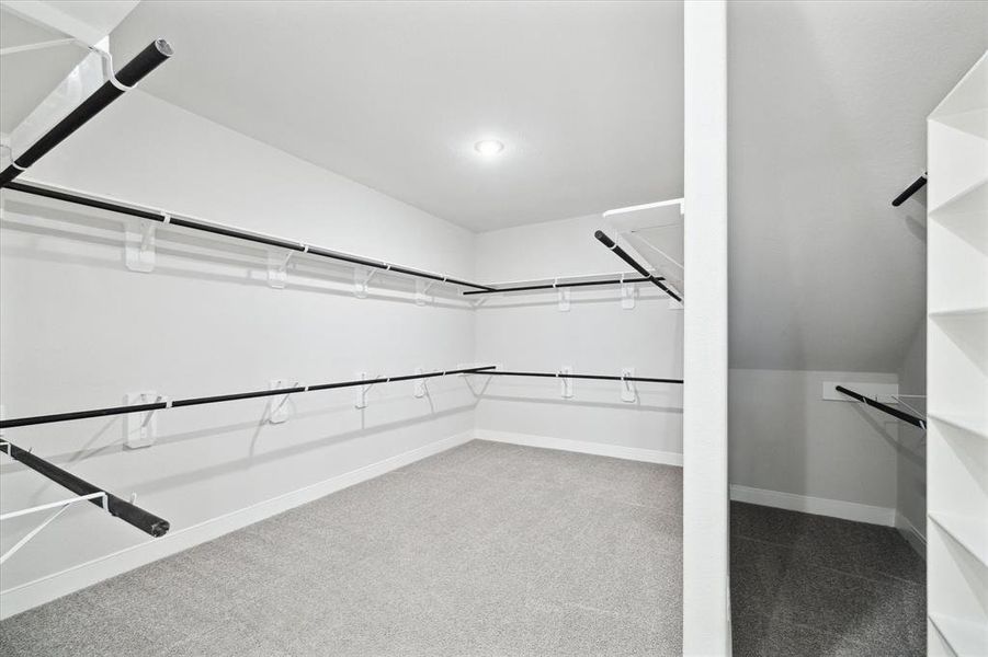 Oversized walk in closet located in the first primary suite.