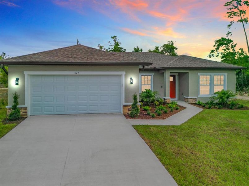 Front exterior of a new home in , Ocala, FL, highlighting curb appeal (Image 1). Front exterior of a new home in , Ocala, FL, highlighting curb appeal (Image 1).