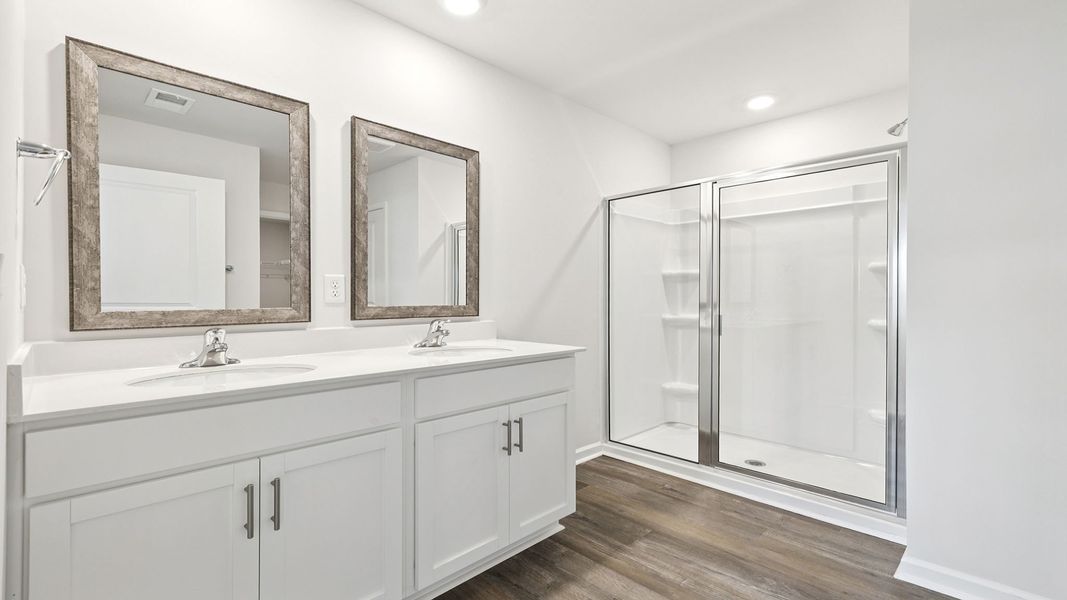 Furnished interior view inside a new home in Bentley Park, Greenwood (Image 10).