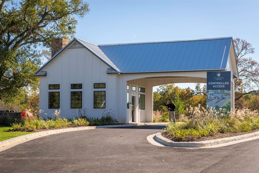 A gated community with controlled access and an attended guardhouse, plus front and backyard lawn maintenance included in HOA fees for a lock-and-leave lifestyle.