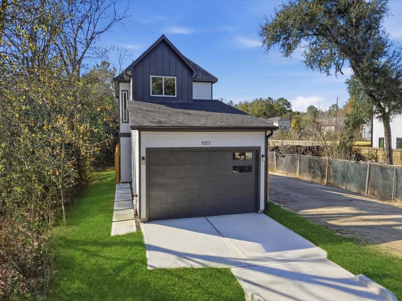 Private Driveway with 2 Car Garage