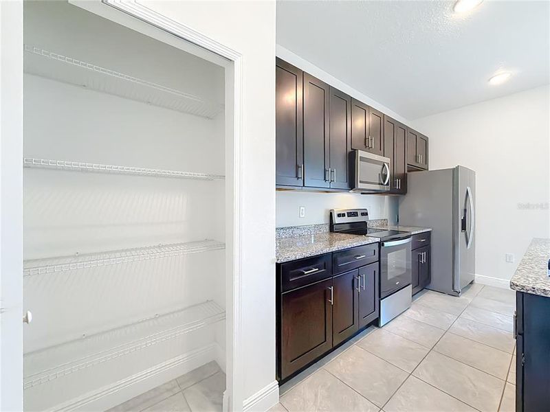 Furnished interior view inside a new home in , Ocala (Image 8).