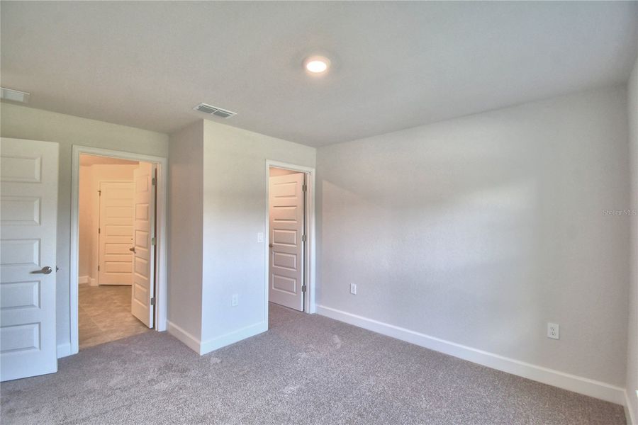 Spacious, unfurnished interior of a new home in Cadence Crossing, Auburndale (Image 41).