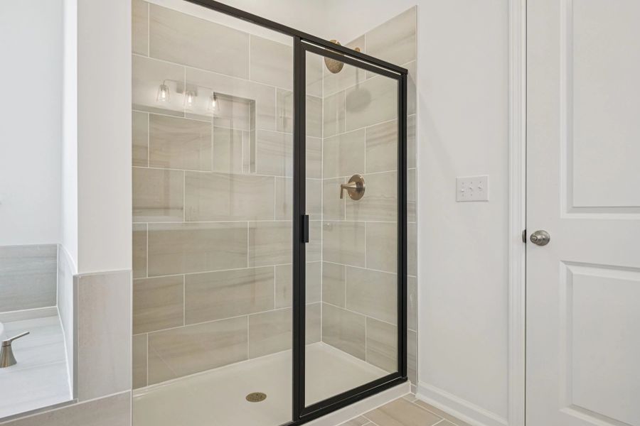 Primary Bath featuring the AW Collection® Sapphire - Clean white and cool hues define the space.