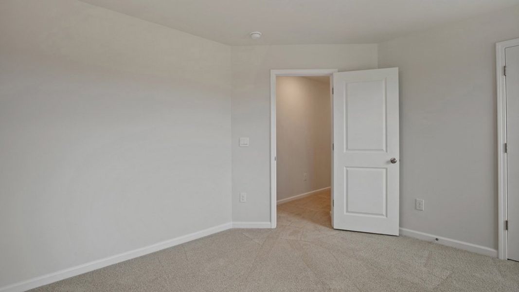 Spacious, unfurnished interior of a new home in The Grove at Matthews Landing, Fuquay Varina (Image 26).