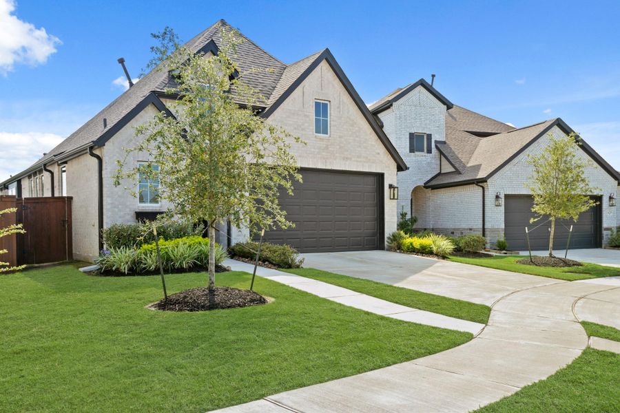 Front exterior of a new home in , Rosharon, TX, highlighting curb appeal (Image 18).