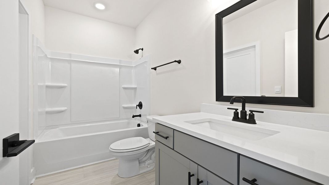 Representative furnished interior of a home built from the BERKSHIRE by D.R. Horton in Sycamore Cove, Woodruff (Image 9).