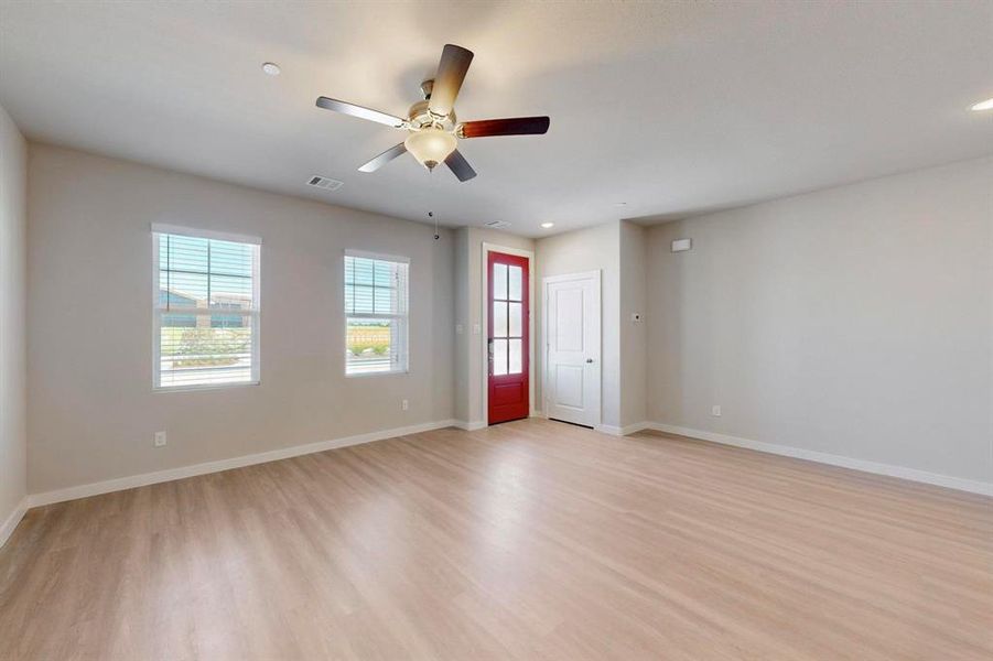 Unfurnished room featuring light wood-style flooring, recessed lighting, and a ceiling fan