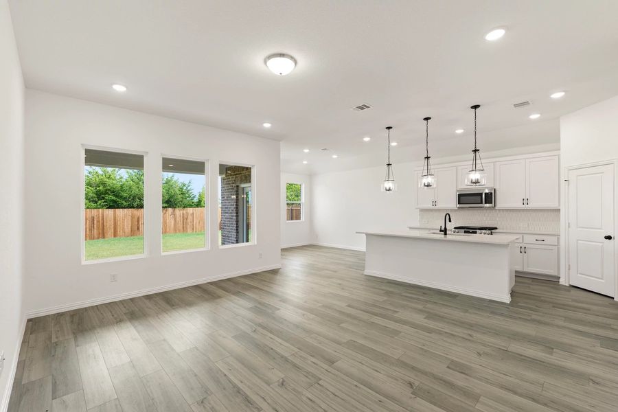 Open Kitchen-Living-Dining Room Representative Photo featuring the Harmony Collection