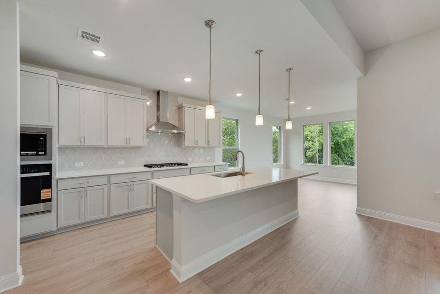 Furnished interior view inside a new home in Valencia On The Lake, Little Elm (Image 12).