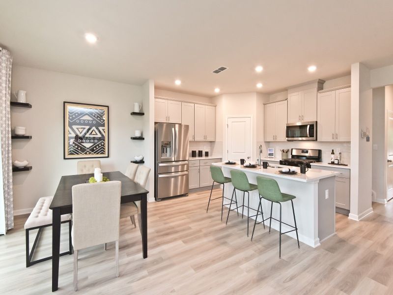 The spacious kitchen island overlooks the dining area and great room.