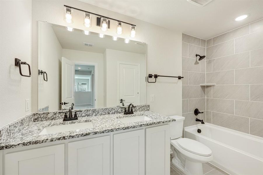 Furnished interior view inside a new home in Mockingbird Hills 60-65, Joshua (Image 10).