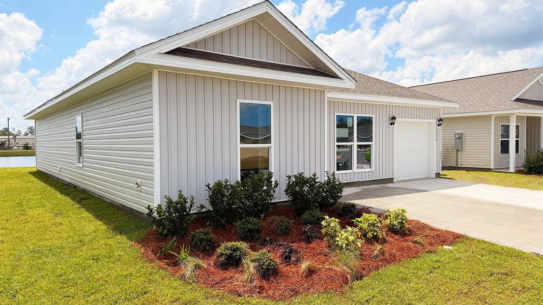 Front exterior of a new home in Liberty, Panama City, FL, highlighting curb appeal (Image 2). Front exterior of a new home in Liberty, Panama City, FL, highlighting curb appeal (Image 2).