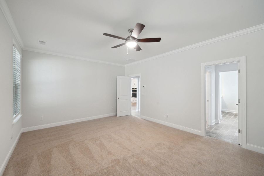 Spacious, unfurnished interior of a new home in Tidewater at Lakes of Cane Bay, Summerville (Image 22).