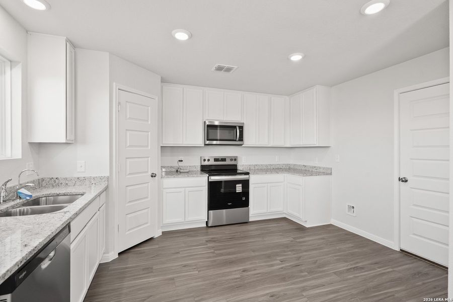 Furnished interior view inside a new home in Applewhite Meadows, San Antonio (Image 11). Furnished interior view inside a new home in Applewhite Meadows, San Antonio (Image 11).