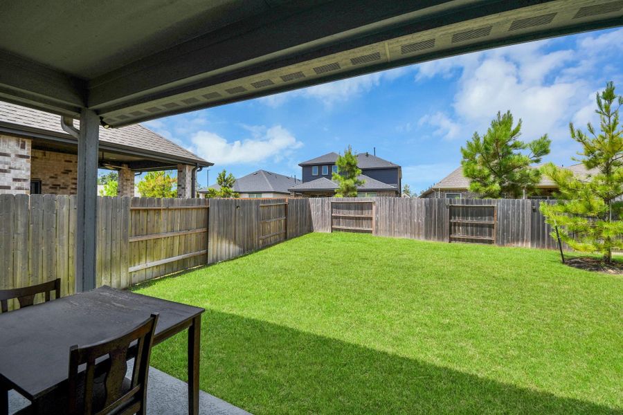 Exterior details and patio area of a home in , Conroe (Image 28).