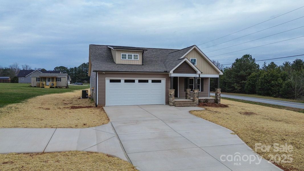 Front exterior of a new home in , Lincolnton, NC, highlighting curb appeal (Image 19).