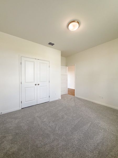 Spacious, unfurnished interior of a new home in TerraVista, Victoria (Image 46).