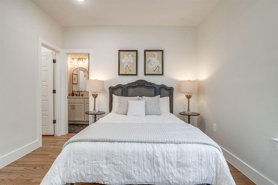 Elegant lighting and rich textures create a relaxing bedroom retreat. Elegant lighting and rich textures create a relaxing bedroom retreat.