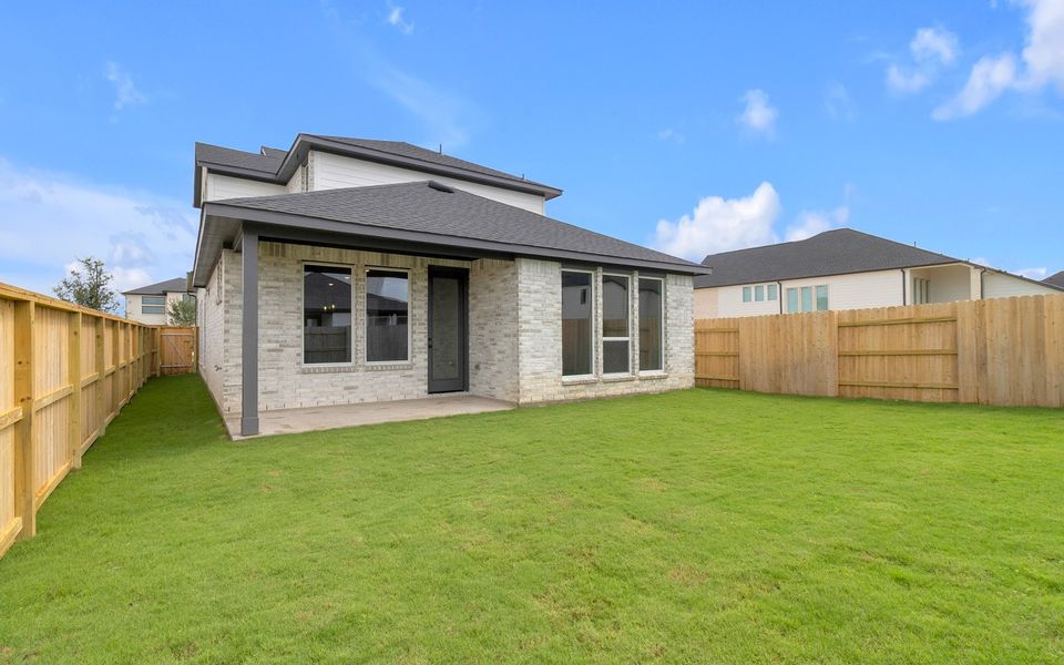 Exterior details and patio area of a home in Elyson, Katy (Image 2). Exterior details and patio area of a home in Elyson, Katy (Image 2).