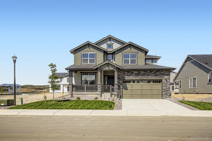 Front exterior of a new home in Riano Ridge: The Monarch Collection, Loveland, CO, highlighting curb appeal (Image 12).