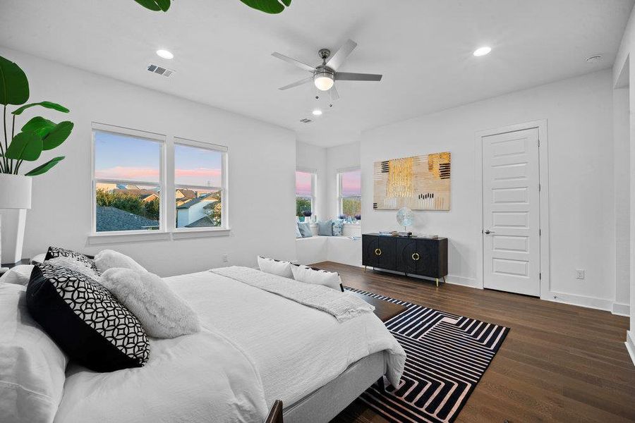 Bedroom with wood finished floors, recessed lighting, and ceiling fan