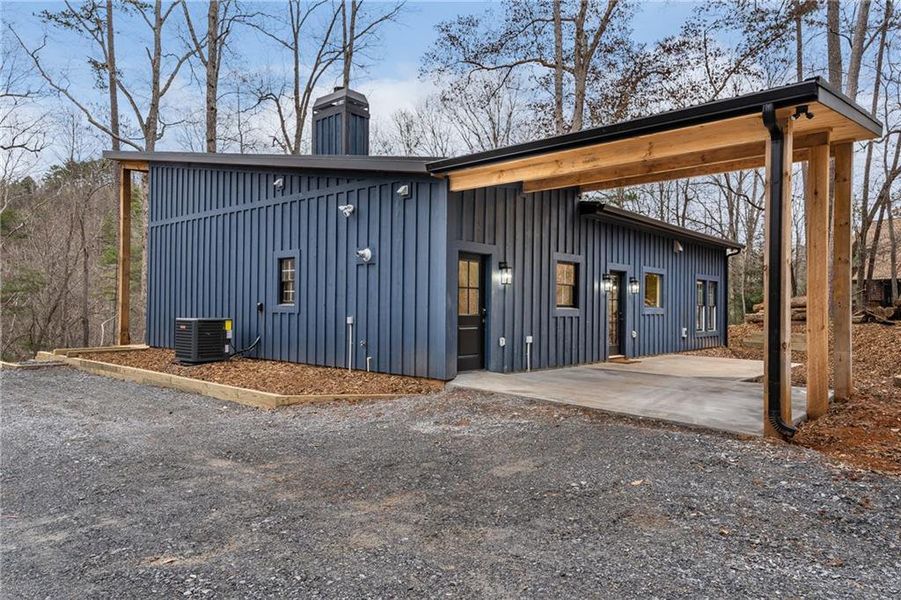 Exterior details and patio area of a home in , Ellijay (Image 26).