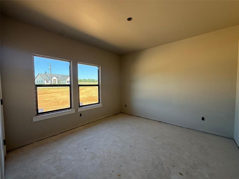In-progress construction of a new home in Freeman Ranch, Weatherford, TX (Image 8).