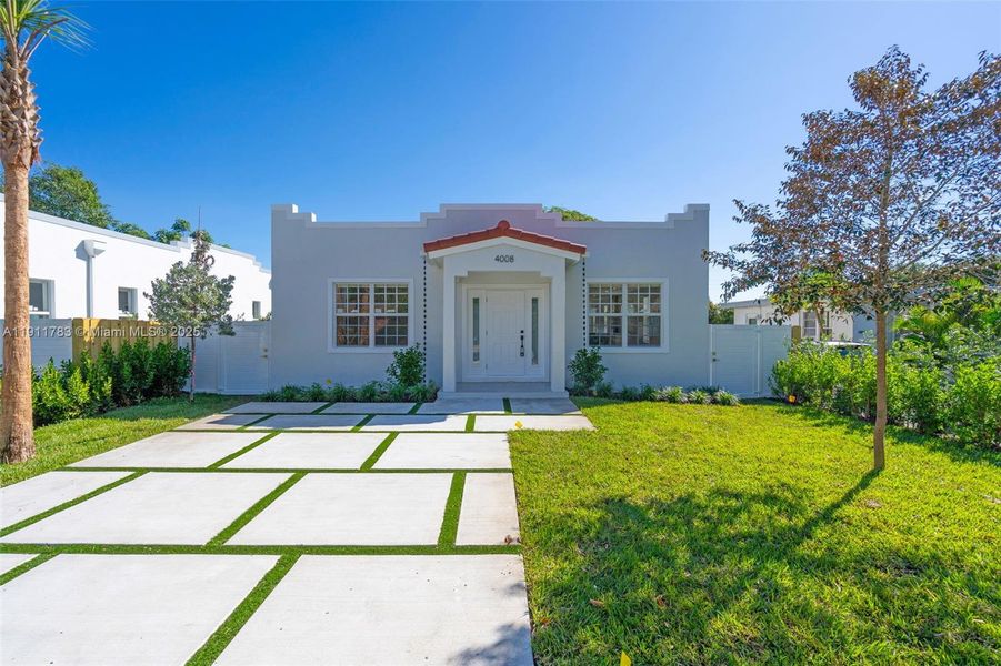 Front exterior of a new home in , West Palm Beach, FL, highlighting curb appeal (Image 22). Front exterior of a new home in , West Palm Beach, FL, highlighting curb appeal (Image 22).