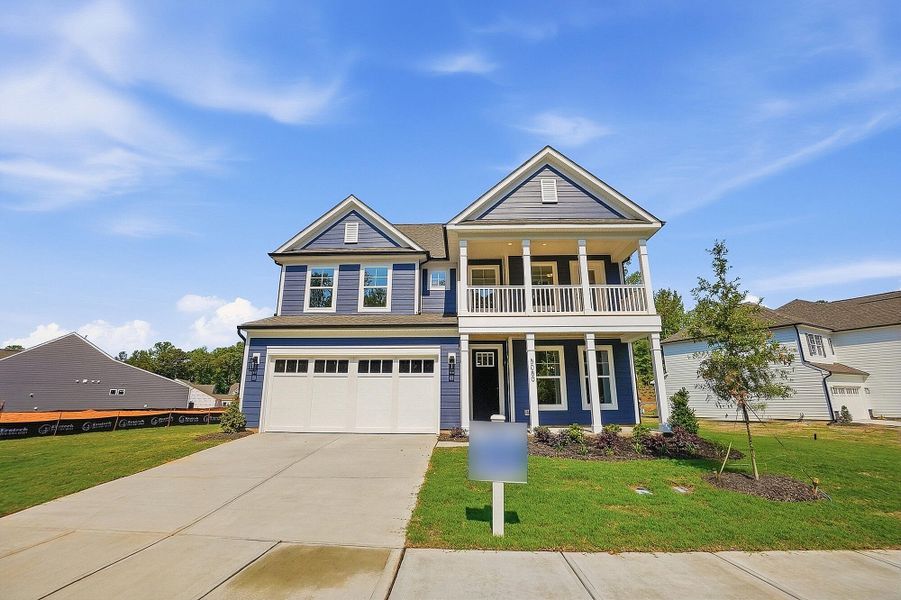 Front exterior of a new home in Rone Creek, Waxhaw, NC, highlighting curb appeal (Image 1). Front exterior of a new home in Rone Creek, Waxhaw, NC, highlighting curb appeal (Image 1).
