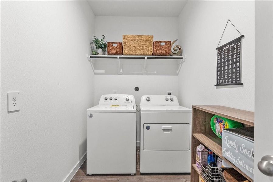 Enjoy the covered back patio overlooking the nice-sized backyard with plenty of space to relax, play, or entertain.