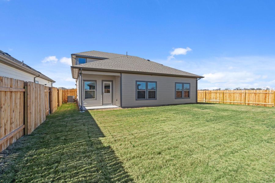 Rear of Home and Private Backyard