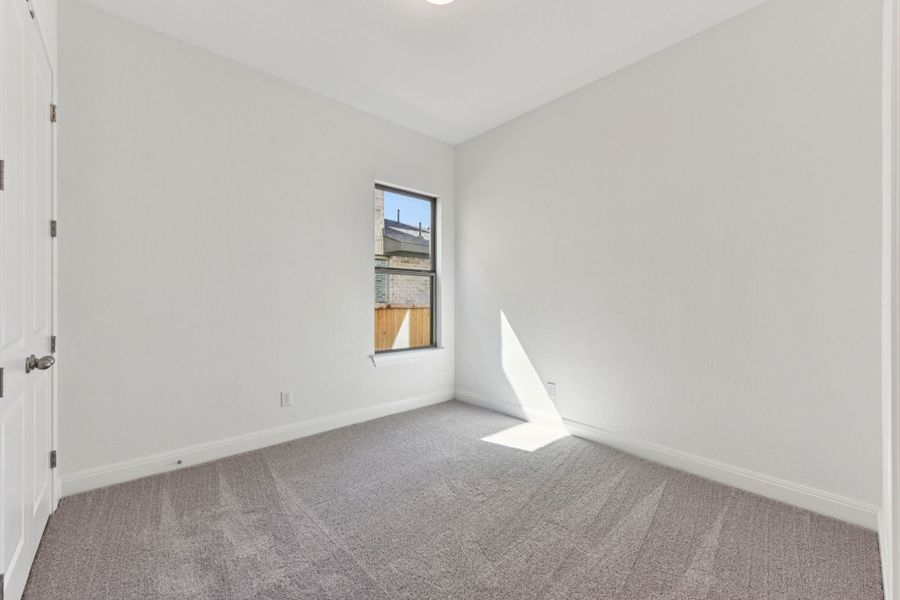 Spacious, unfurnished interior of a new home in 6 Creeks, Kyle (Image 13).