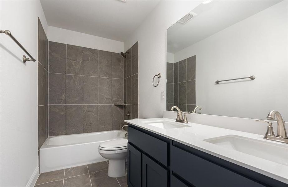 Furnished interior view inside a new home in Stone Henge II, Sanger (Image 5).