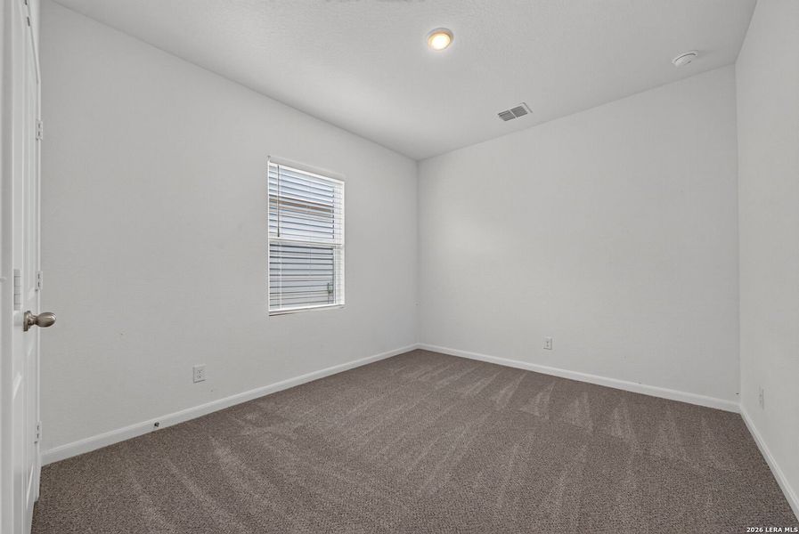 Spacious, unfurnished interior of a new home in Hennersby Hollow, San Antonio (Image 26).