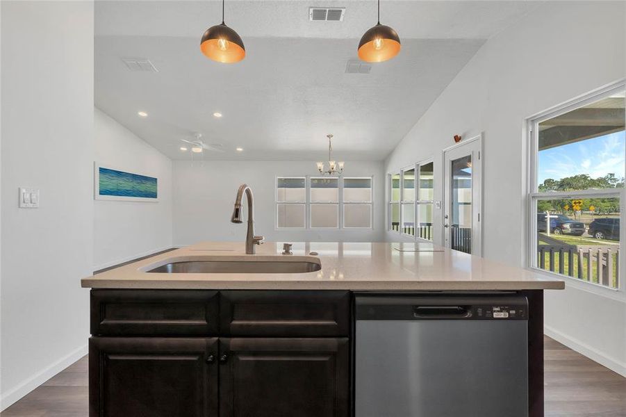 Kitchen w/ Island & Stainless Appliances