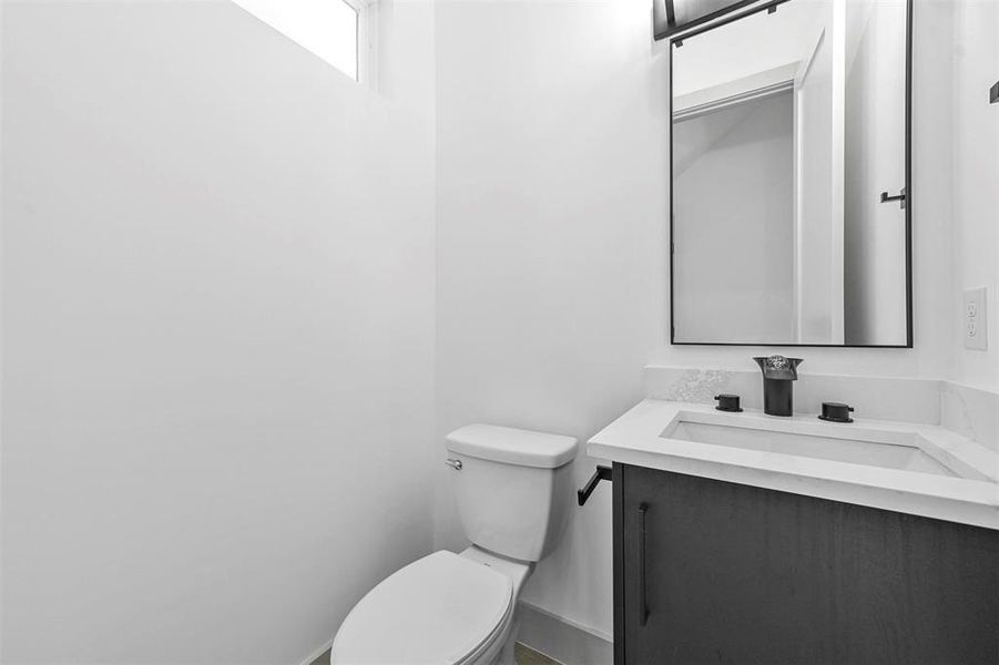 Bathroom with vanity and toilet